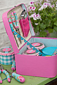 Handmade, feminine tool box in shades of pink and pale blue