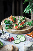 Bruschetta on a bread board, along with various vegetables