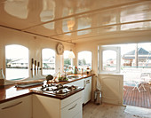 Open kitchen and access to the terrace on a houseboat
