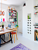 Colourful accessories in a kitchen with a white floor