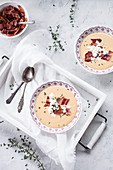 Parsnip and sweet potato soup with crispy bacon and cottage cheese