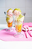 Colourful sundae with homemade fruit ice cream