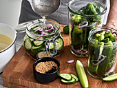 Cucumbers being pickled
