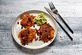 Sweet potato pancakes with guacamole and pomegranate