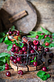 Cherries in a wire basket