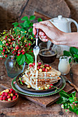 Wild strawberry crepes with creamy sauce