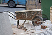 Cement wheelbarrow during building work