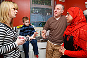 Social worker visiting family at home