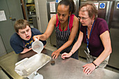 Students with learning disabilities learning to cook