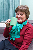 Chemotherapy patient sitting at home