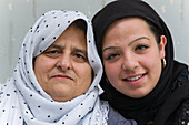 Portrait of young and older women together