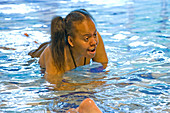 Woman with learning disabilities at a swimming session