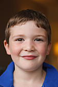 Portrait of white boy smiling