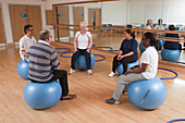 Older people doing exercise class