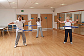 Older people doing exercise class