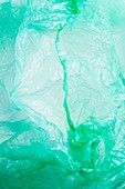 Close-up of green plastic shopping bag