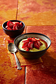 Turmeric semolina pudding with strawberries in ginger honey marinade
