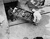Removing tray of chariot parts from the Tomb of Tutankhamun