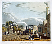 Locomotive taking in water at Parkside, 1833