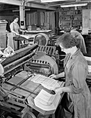 A folding machine in a printworks, 1959