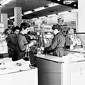 Shoppers at a checkout in a London supermarket, c1950s