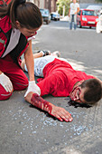 Paramedic with car accident victim