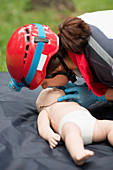 CPR training on baby dummy