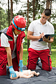 CPR training on baby dummy