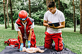 CPR training on baby dummy