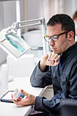 Prosthetic dentistry technician at work