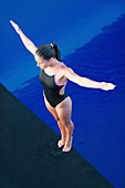 Female diver on platform
