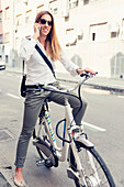 Female commuter on electric bicycle