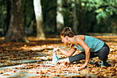 Woman stretching in the park