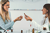 Homeopath giving remedy to woman