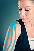 Kinesio tape on shoulder