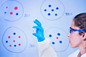 Researcher holding sample in lab