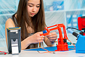 Girl working on robotics project