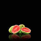 Whole and cut guavas, illustration