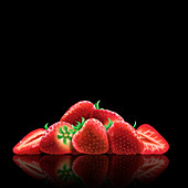 Whole and cut fresh strawberries, illustration