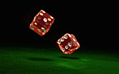 Close up of two rolling dice, illustration