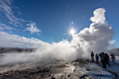 Tourists at Strokkur Geyser, Iceland