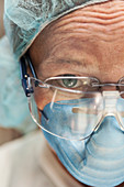 Scientist wearing safety goggles and mask