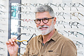 Man trying prescription glasses