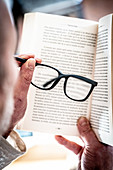 Man reading with glasses