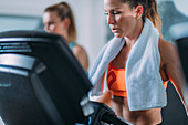 Women exercising on treadmill
