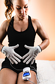 Hand physical therapy with TENS conductive gloves