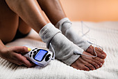 Physical therapy with TENS machine