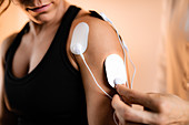 Physical therapy with TENS machine