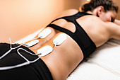 Physical therapy with TENS machine