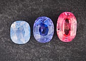 Three cut gemstones